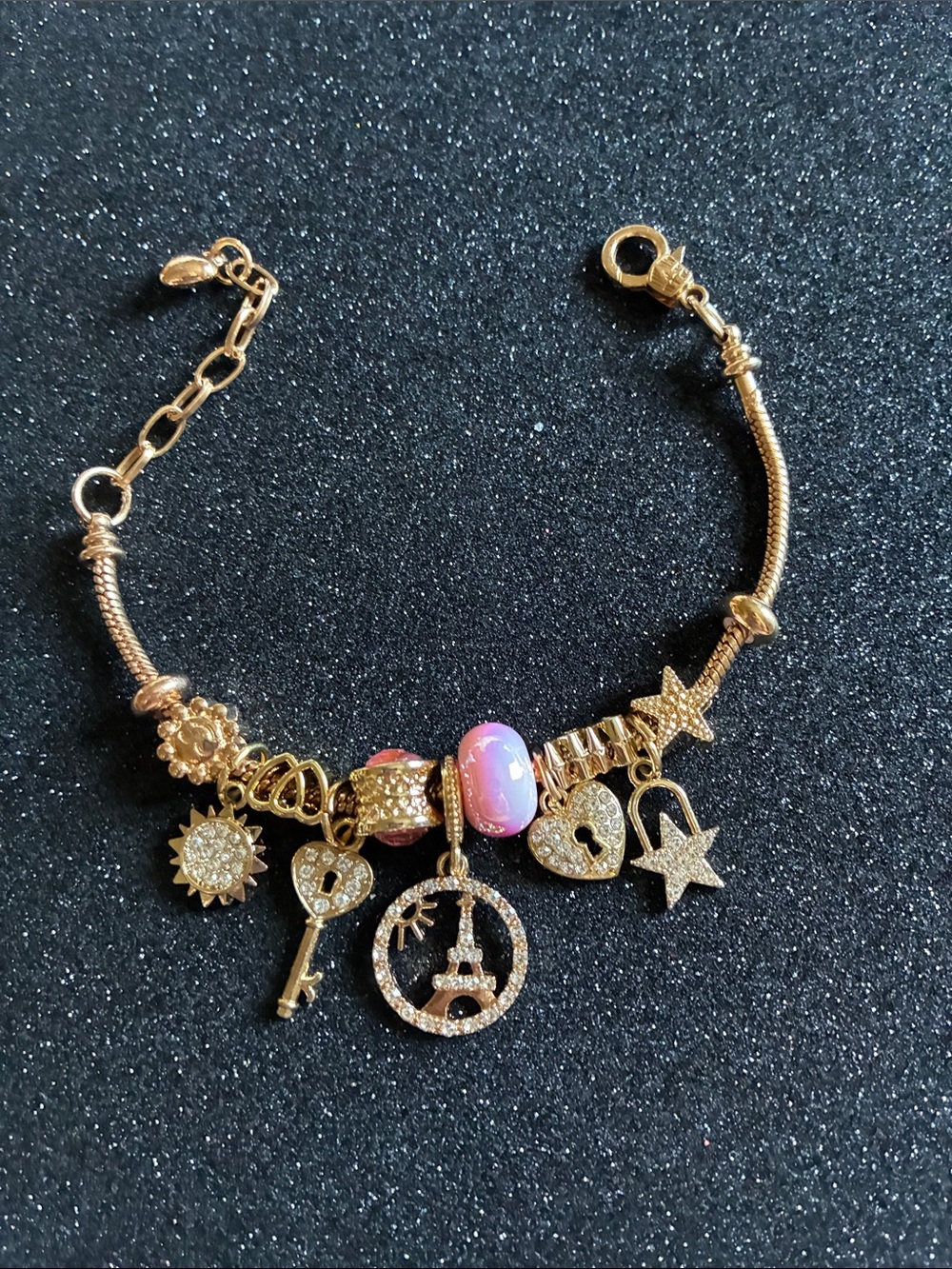 Gold Charm Bracelet with Pink Opal Bead and Eiffel Tower Pendant